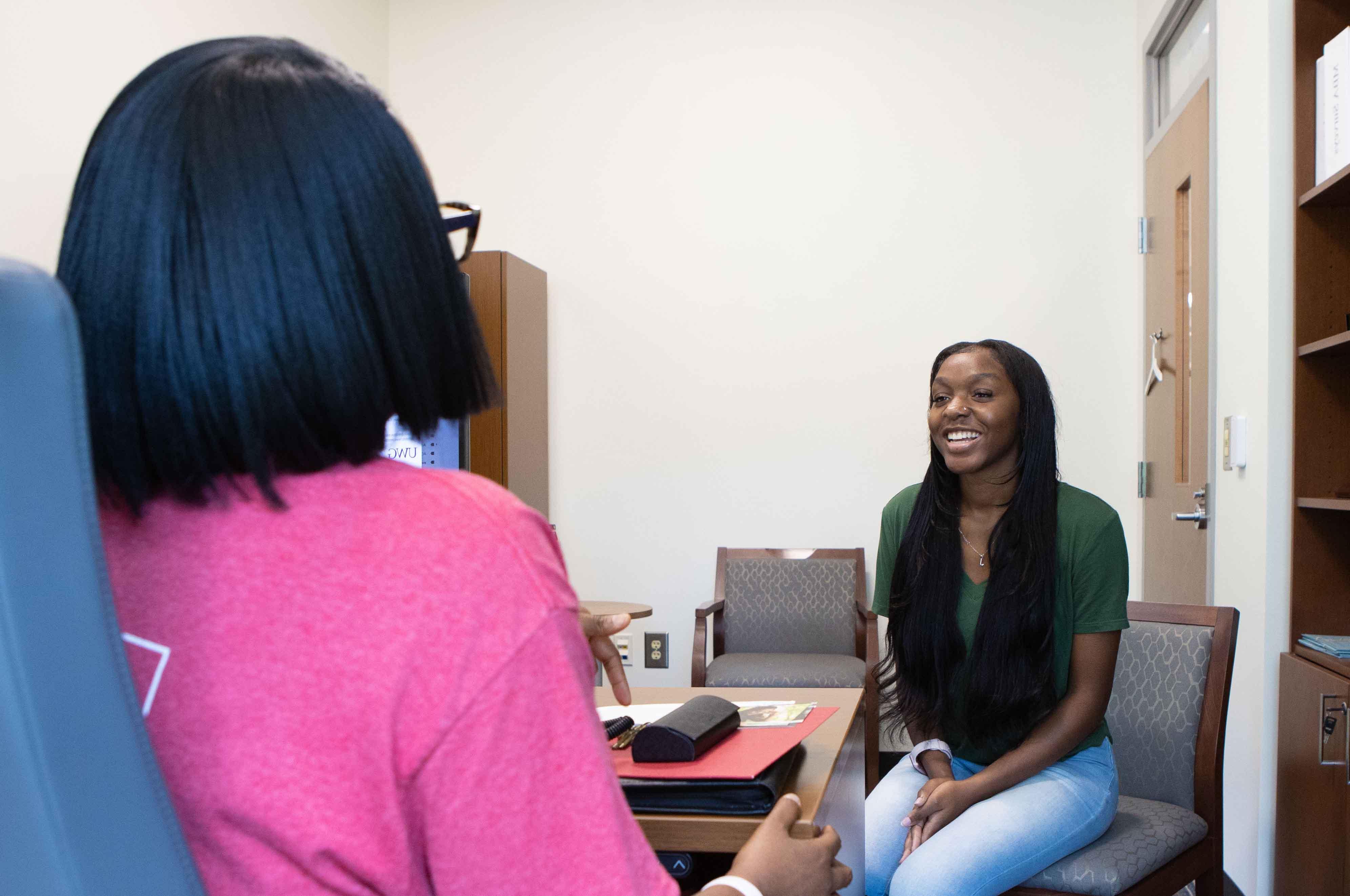 A student talking to an advisor